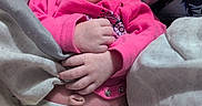 Nevaeh joined the competition — help win amazing prizes! baby, infant, child, portrait, pink_outfit, diaper, blanket, bedding, lying_down, sitting, wide_eyes, face, hands, legs, indoor, cozy, close_up, photography, soft_fabric, newborn