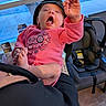 Nevaeh joined the competition — help win amazing prizes! baby, infant, child, yawning, waving, pink_outfit, cap, car_seat, automobile, portrait, indoors, window, daylight, seated, caregiver, hand, foot, floral_design, 安全, candid