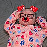 Nevaeh joined the competition — help win amazing prizes! baby, infant, sleeping, portrait, face, glasses, headband, spiderman, costume, pink, onesie, patterned_clothing, strawberry, flower, heart, rainbow, blanket, bed, indoor, cute
