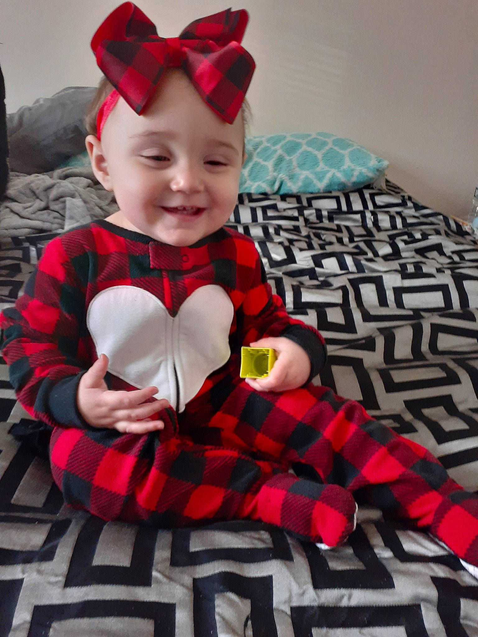 Chloe Anne is registered to the contest to win money with this photo: baby, baby_bloomers, baby_products, baby_toddler_clothing, child, costume, costume_accessory, design, ear, headgear, joy, outerwear, pattern, person, pink, plaid, red, sleeve, tartan, textile