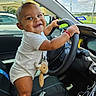 baby, bracelet, car, car_seat, child, clothing, cute, dashboard, hand, happy, infant, interior, person, plush_toy, seat, smile, steering_wheel, sunlight, toy, window