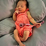 Giavanna is registered to the contest to win money with this photo: newborn, baby, sleeping, infant, romper, pink, pacifier, clip, bed, bedding, gray, soft, resting, peaceful, cute, small, hand, foot, face, child