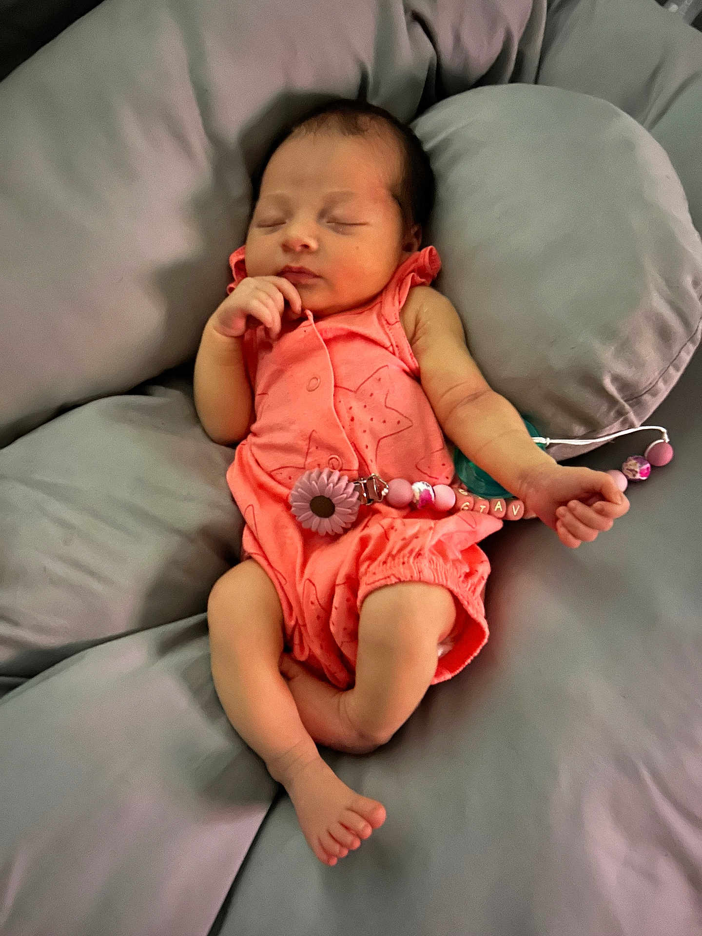 Giavanna is registered to the contest to win money with this photo: newborn, baby, sleeping, infant, romper, pink, pacifier, clip, bed, bedding, gray, soft, resting, peaceful, cute, small, hand, foot, face, child