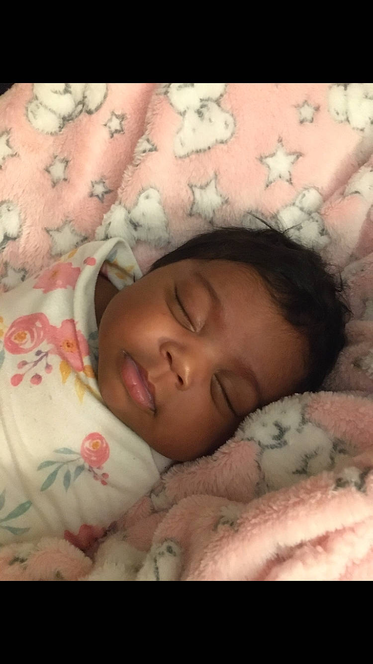 Alia is registered to the contest to win money with this photo: baby, baby_sleeping, baby_toddler_clothing, bed_sheet, bedding, bedtime, blanket, cheek, child, comfort, eyebrow, linens, nap, peach, person, pink, skin, sleep, textile, toddler