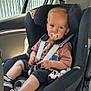 Eyden participe au concours pour gagner de l'argent avec cette photo : toddler, child, car_seat, pacifier, plush_toy, mickey_mouse, car_interior, seatbelt, clothing, shorts, sneakers, window, daylight, toy, person, cute, sitting, baby, car, child_safety