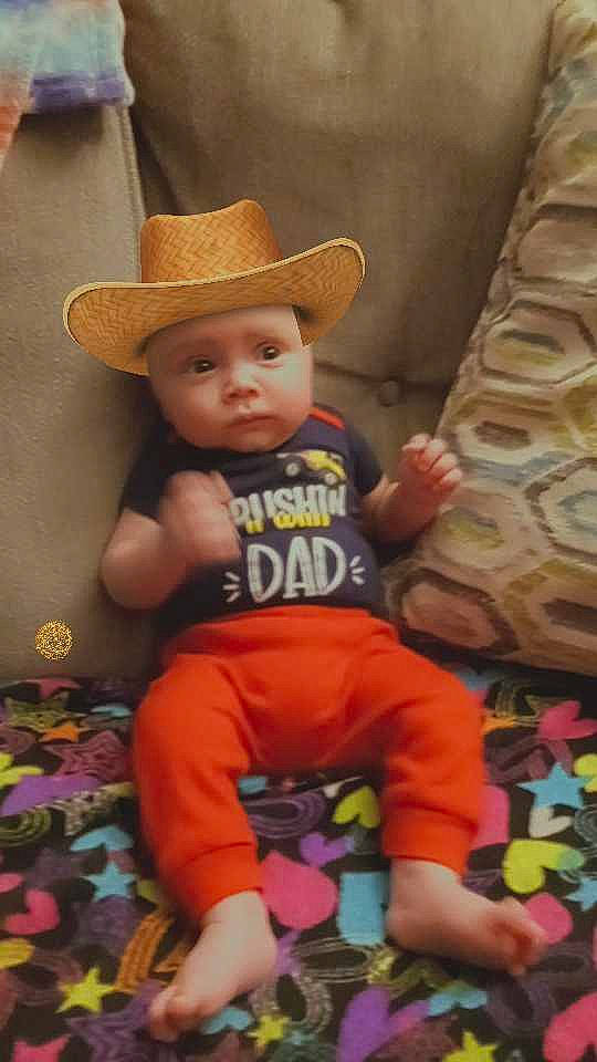Nolan is registered to the contest to win money with this photo: baby, baby_products, baby_toddler_clothing, cap, child, comfort, costume_hat, cowboy_hat, eye, fashion_accessory, fedora, fun, happy, hat, headwear, person, skin, sleeve, sun_hat, toddler