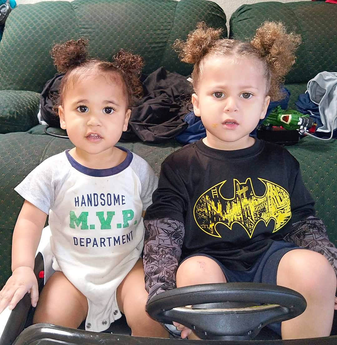 Deshawn is registered to the contest to win money with this photo: baby_toddler_clothing, black, cheek, chin, eye, face, facial_expression, fashion, hair, hairstyle, happy, head, neck, organ, person, photograph, product, skin, sleeve, vertebrate