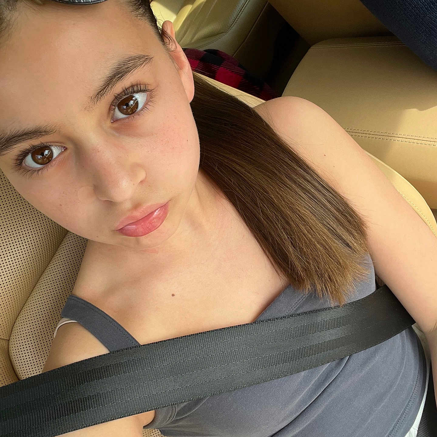 Olivia is registered to the contest to win money with this photo: accessories, adult, belt, cushion, dimples, face, female, glasses, hair, head, headrest, homedecor, person, photography, portrait, seatbelt, selfie, sunglasses, transportation, woman