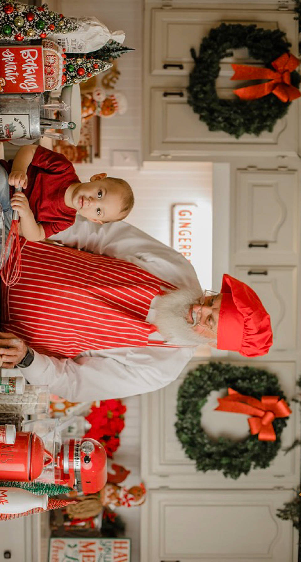 Curtis is registered to the contest to win money with this photo: baby, chair, child, door, dress, event, floral_design, fun, happy, headwear, orange, peach, person, picture_frame, plant, red, room, sitting, toddler, tradition