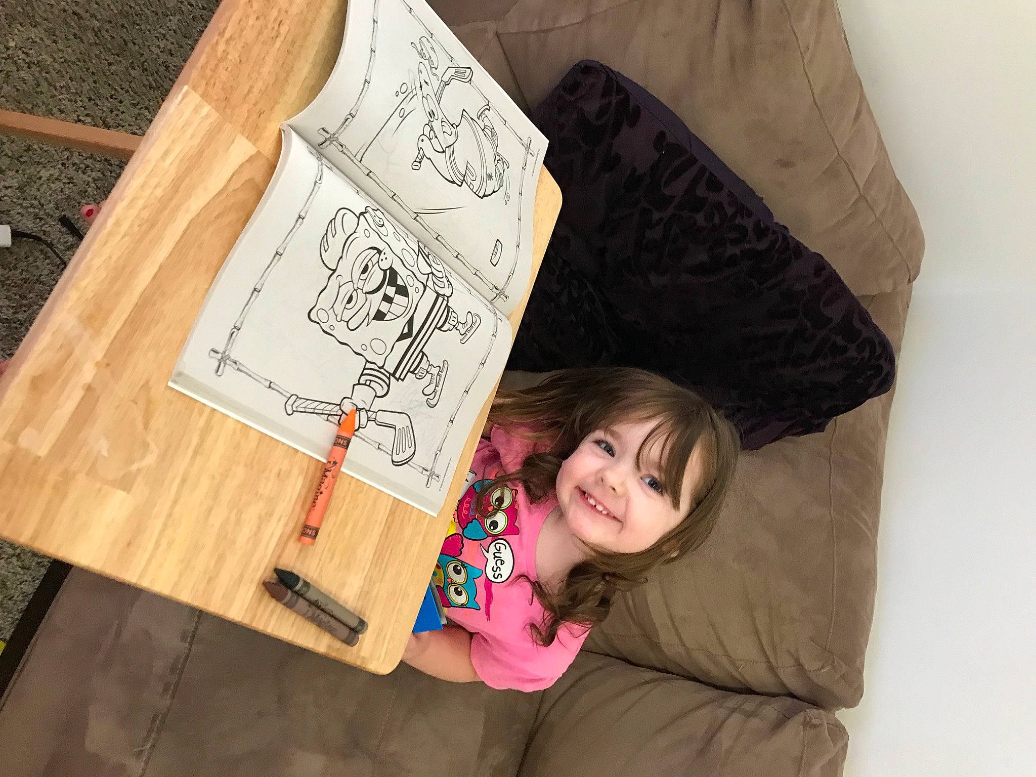 Katrina is registered to the contest to win money with this photo: child, comfort, flooring, font, fun, handwriting, happy, hardwood, human, joy, linens, magenta, pattern, person, room, sitting, sleeve, smile, t_shirt, toddler