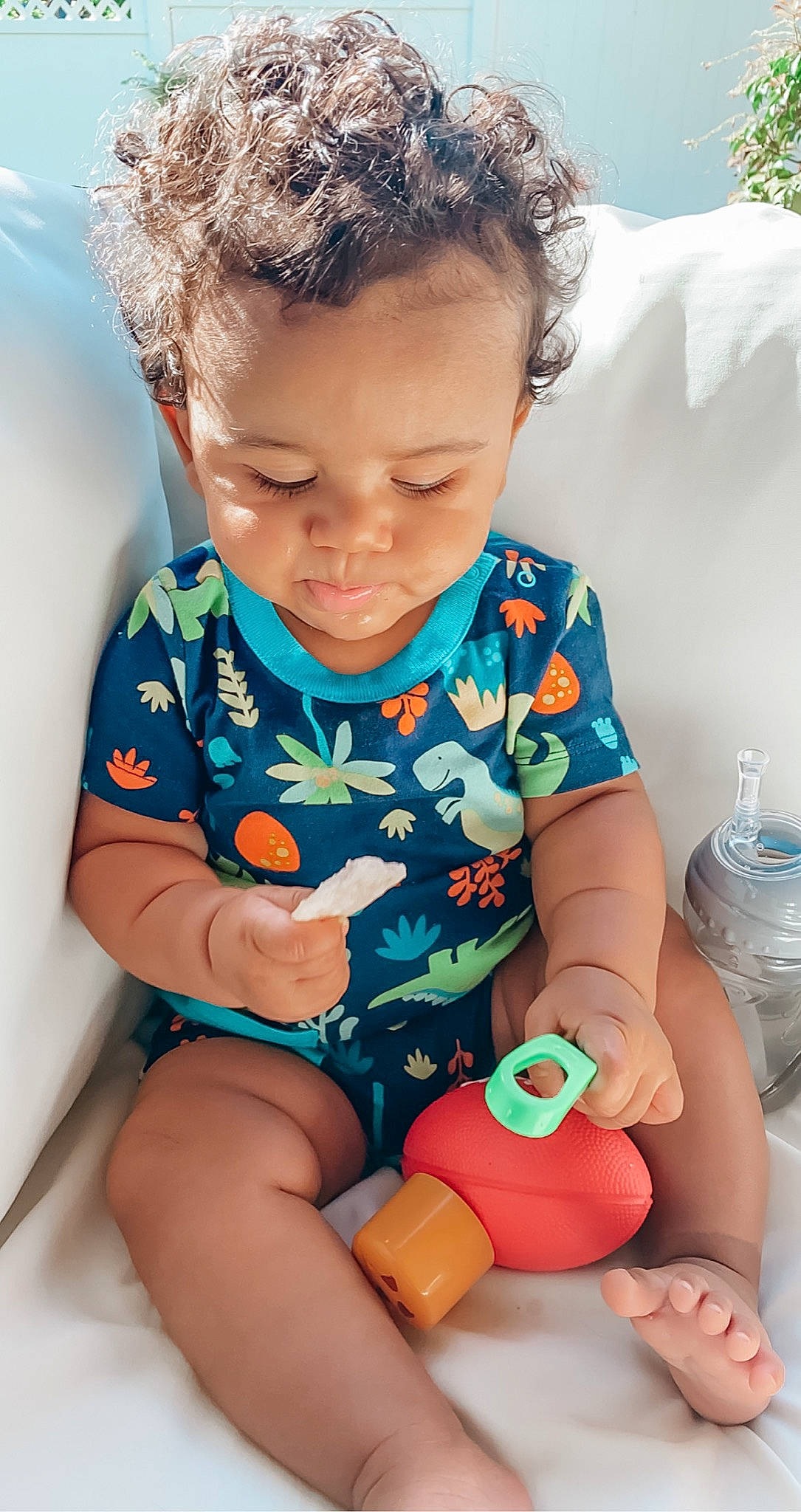 Santana joined the competition — help win amazing prizes! arm, baby, baby_toddler_clothing, cheek, child, dress, face, finger, fun, hairstyle, hand, happy, human_body, organ, people, person, plastic_bottle, product, skin, sleeve