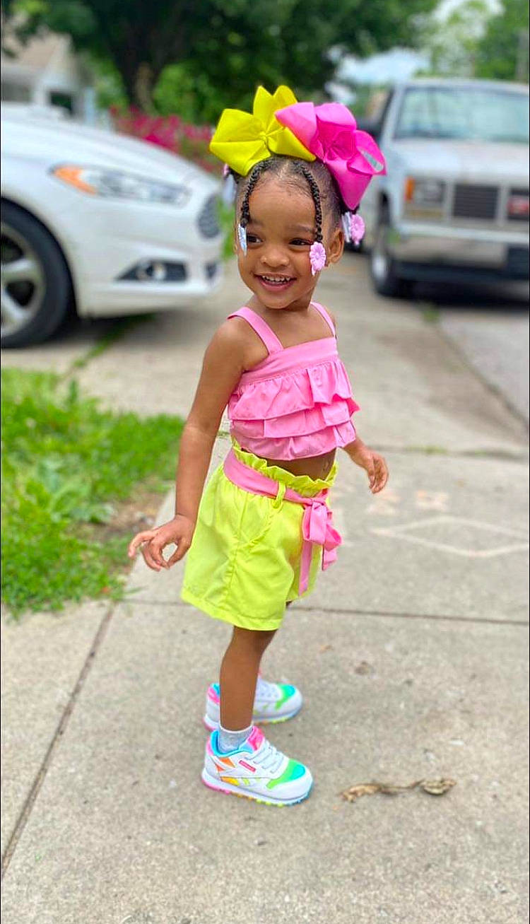 Kalena joined the competition — help win amazing prizes! asphalt, car, face, happy, infrastructure, joy, land_vehicle, magenta, motor_vehicle, person, pink, plant, public_space, road, smile, summer, tire, toddler, vehicle, wheel