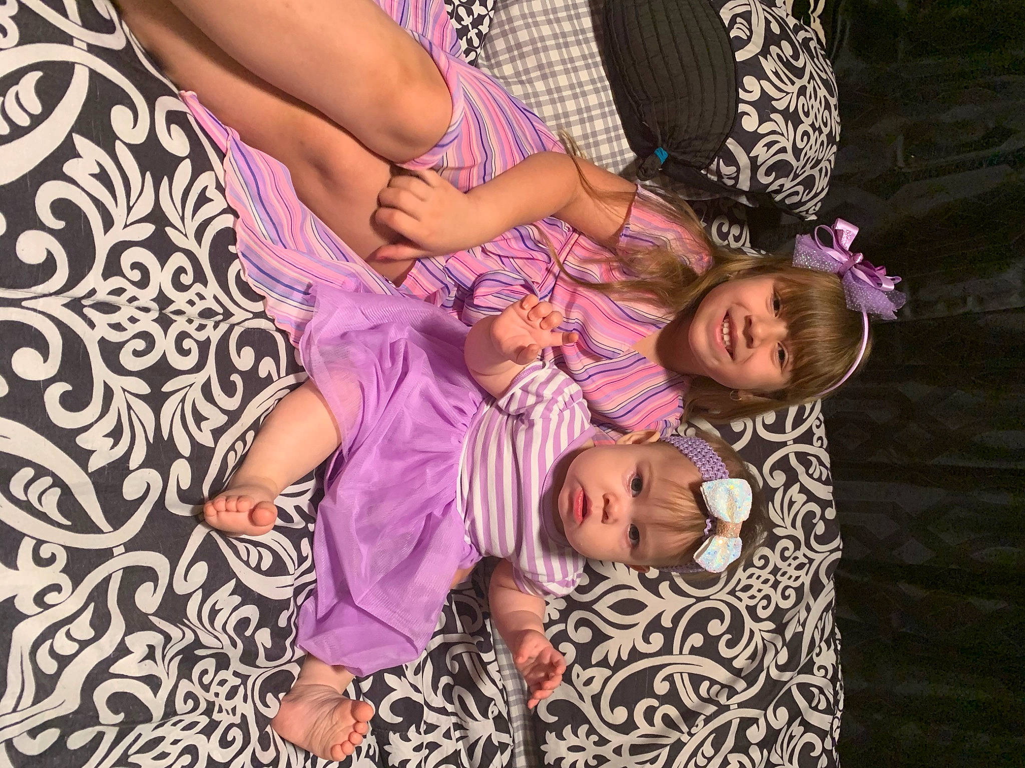 Angelina is registered to the contest to win money with this photo: child, design, family, fun, headwear, joy, pattern, person, smile, toddler, violet