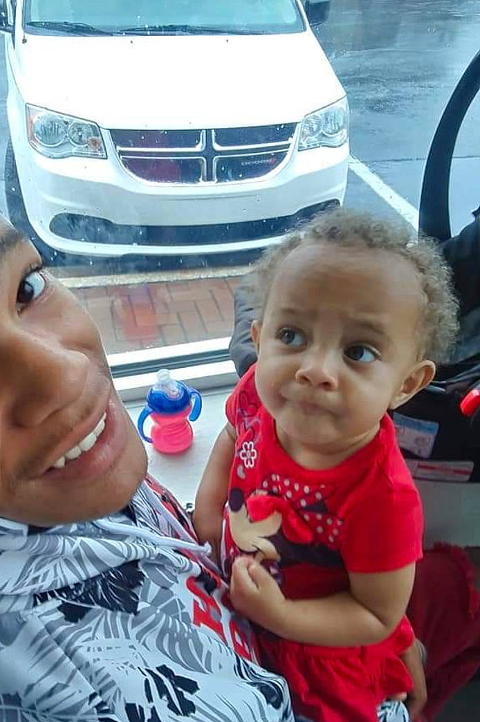 Everly is registered to the contest to win money with this photo: automotive_design, automotive_exterior, automotive_lighting, automotive_tire, bumper, car, fun, grille, happy, headlamp, hood, joy, leisure, mode_of_transport, motor_vehicle, person, snapshot, toddler, van, vehicle