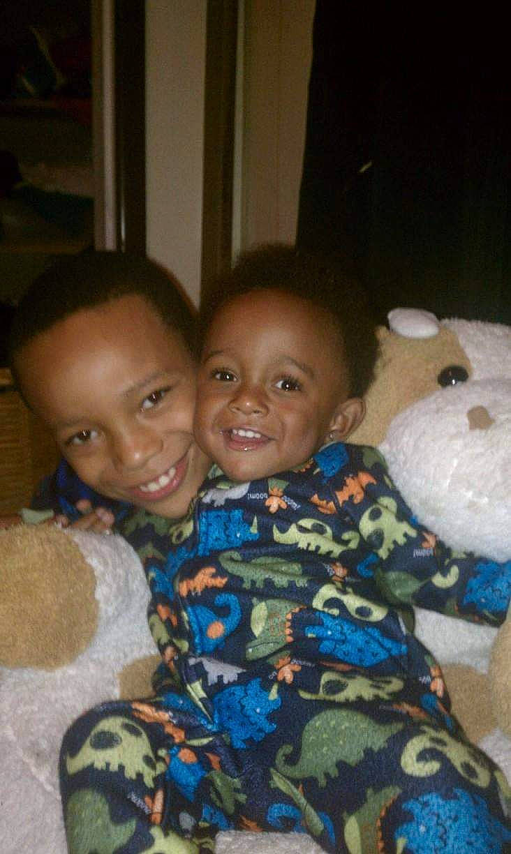 Akeem is registered to the contest to win money with this photo: baby, baby_toddler_clothing, cheek, child, face, happy, head, human_body, interaction, iris, joy, mouth, nose, organ, person, sharing, skin, smile, textile, toddler