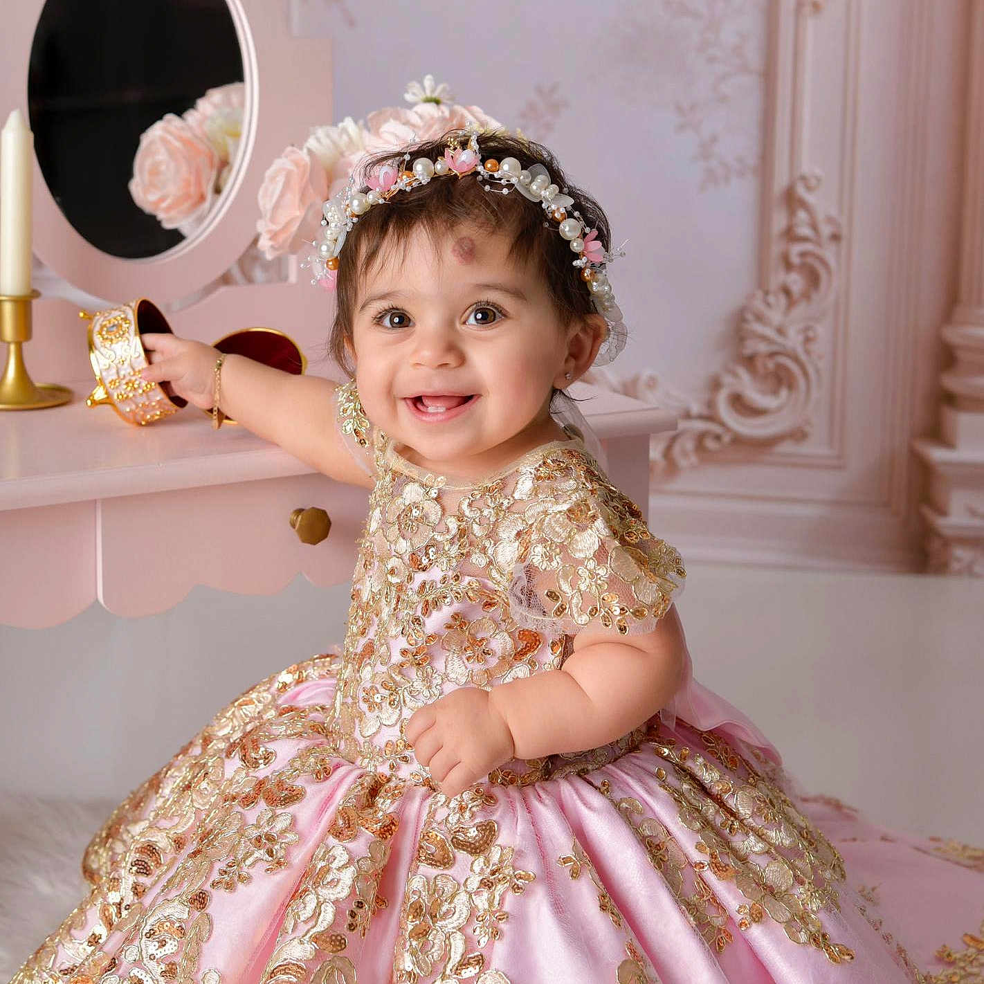 Nayeli is registered to the contest to win money with this photo: baby, child, girl, smile, dress, pink, gold, embroidery, headband, jewelry_box, vanity_table, flower, decor, indoor, portrait, happy, cute, cute_baby, celebration, fashion