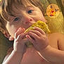 Karter joined the competition — help win amazing prizes! child, toddler, corn_on_the_cob, food, eating, high_chair, indoor, person, face, hands, hair, skin, blue_eyes, seat, cartoon_pattern, closeup, meal, baby, cute, snack