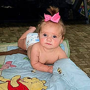 Kacelynn joined the competition — help win amazing prizes! baby, child, pink_bow, diaper, blanket, winnie_the_pooh, quilt, bee, floor, indoor, cute, blue_eyes, infant, playtime, soft_toy, carpet, lying_down, young_child, cute_expression, toddler