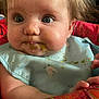 Kacelynn joined the competition — help win amazing prizes! baby, messy, food, bib, wild_hair, blue_eyes, face, hands, colorful, seat, clothing, indoor, child, curious, messy_face, expression, closeup, infant, smudged_food, cute