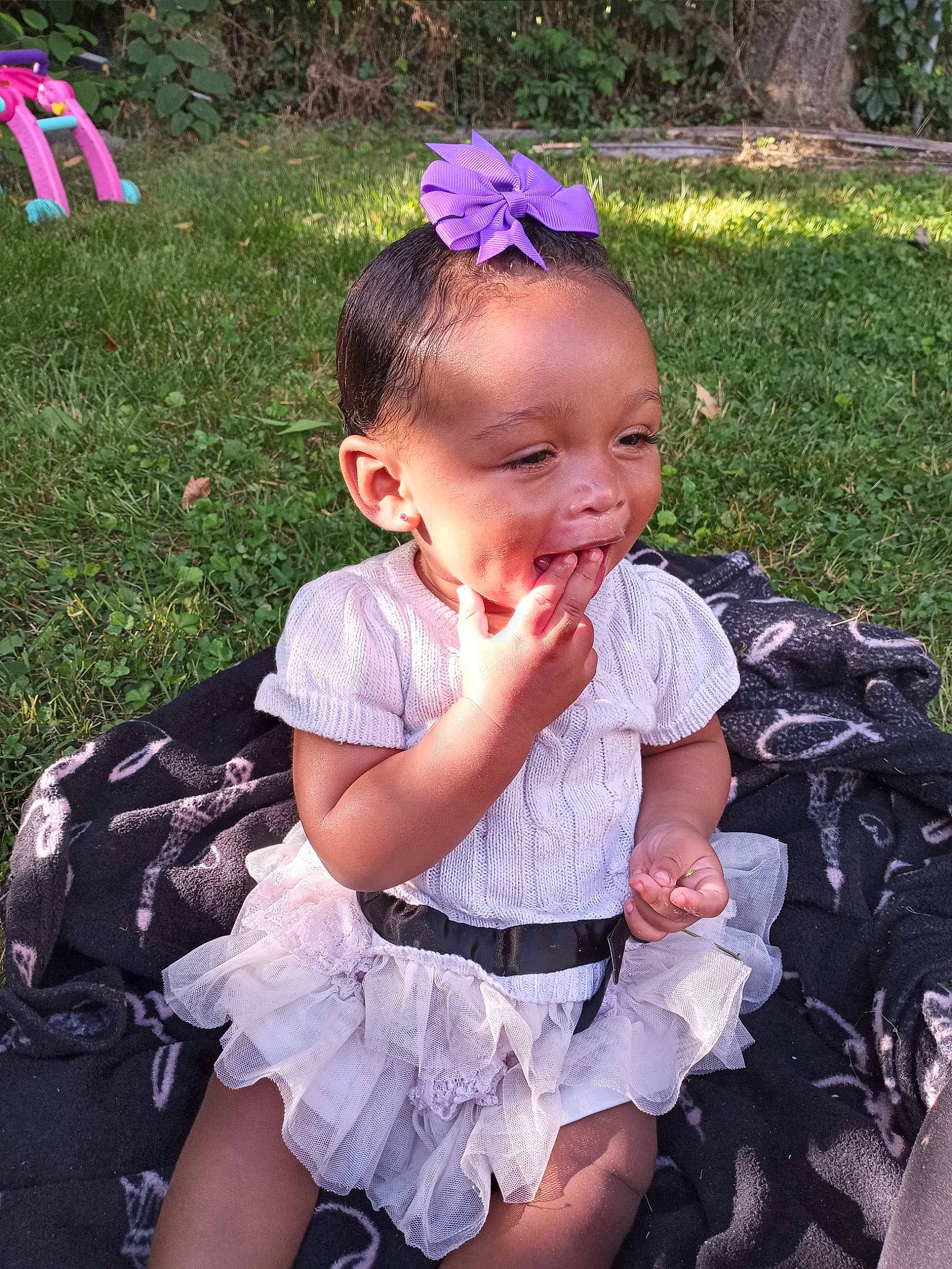 Neahmani is registered to the contest to win money with this photo: baby, baby_toddler_clothing, beauty, child, dress, event, fun, grass, green, hairstyle, happy, headband, headpiece, jewellery, person, photograph, pink, plant, purple, summer