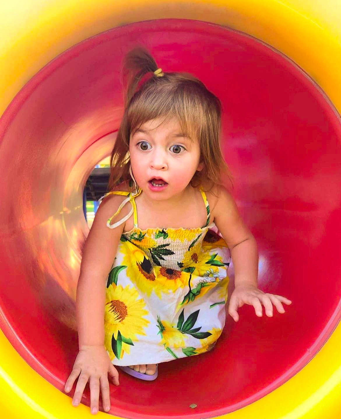 Jazlyn joined the competition — help win amazing prizes! baby_toddler_clothing, beauty, child, circle, facial_expression, fun, happy, leisure, magenta, organ, outdoor_play_equipment, person, pink, play, playground, recreation, red, snapshot, surprise, t_shirt