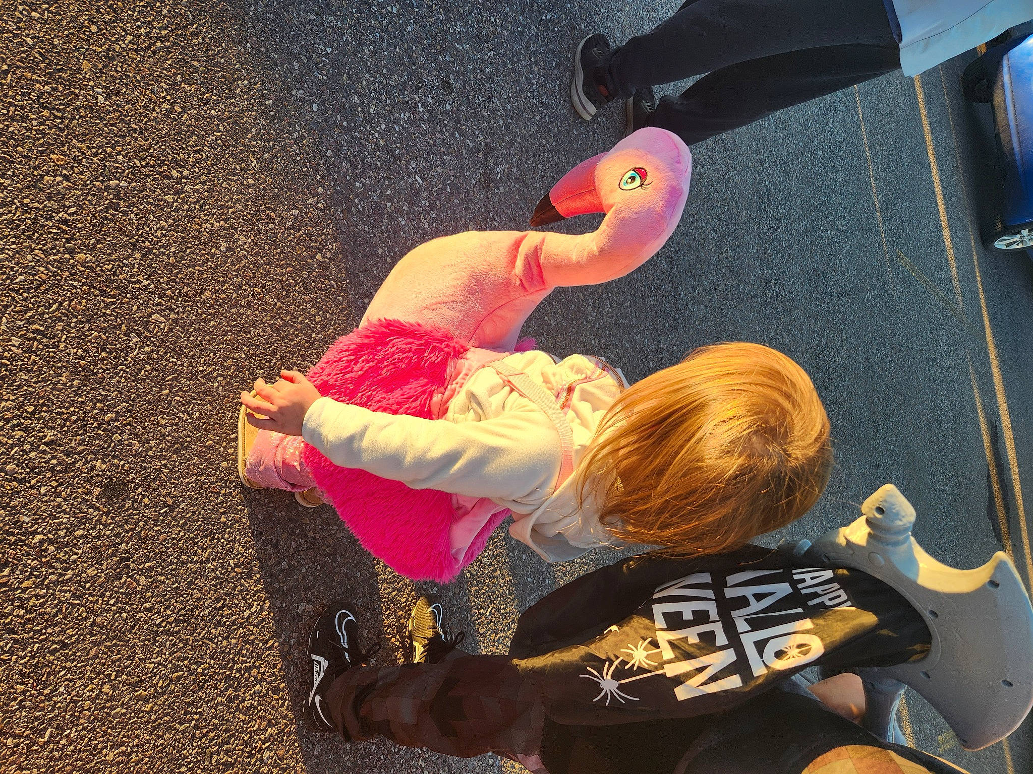 Jazlyn is registered to the contest to win money with this photo: animation, audio_equipment, carmine, child, elbow, fun, gesture, hat, magenta, person, play, room, selfie, sitting, sportswear, stuffed_toy, t_shirt, thigh, toy