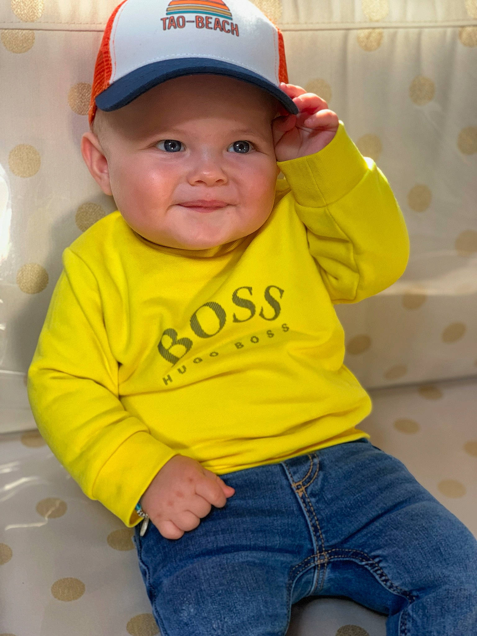 Kyle participe au concours pour gagner de l'argent avec cette photo : baby_toddler_clothing, cap, cheek, chin, clothing, cricket_cap, eye, face, head, headgear, headwear, human_body, jeans, leg, lip, nose, person, skin, sleeve, smile