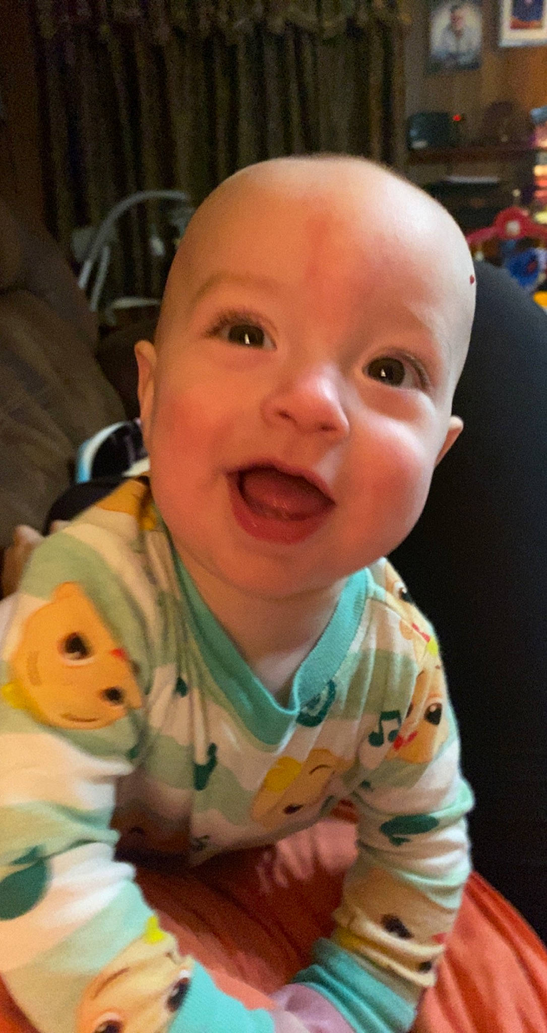 Justin is registered to the contest to win money with this photo: baby, baby_toddler_clothing, cheek, child, comfort, eyebrow, finger, flooring, fun, happy, iris, lip, mouth, nose, person, room, skin, sleeve, smile, thumb