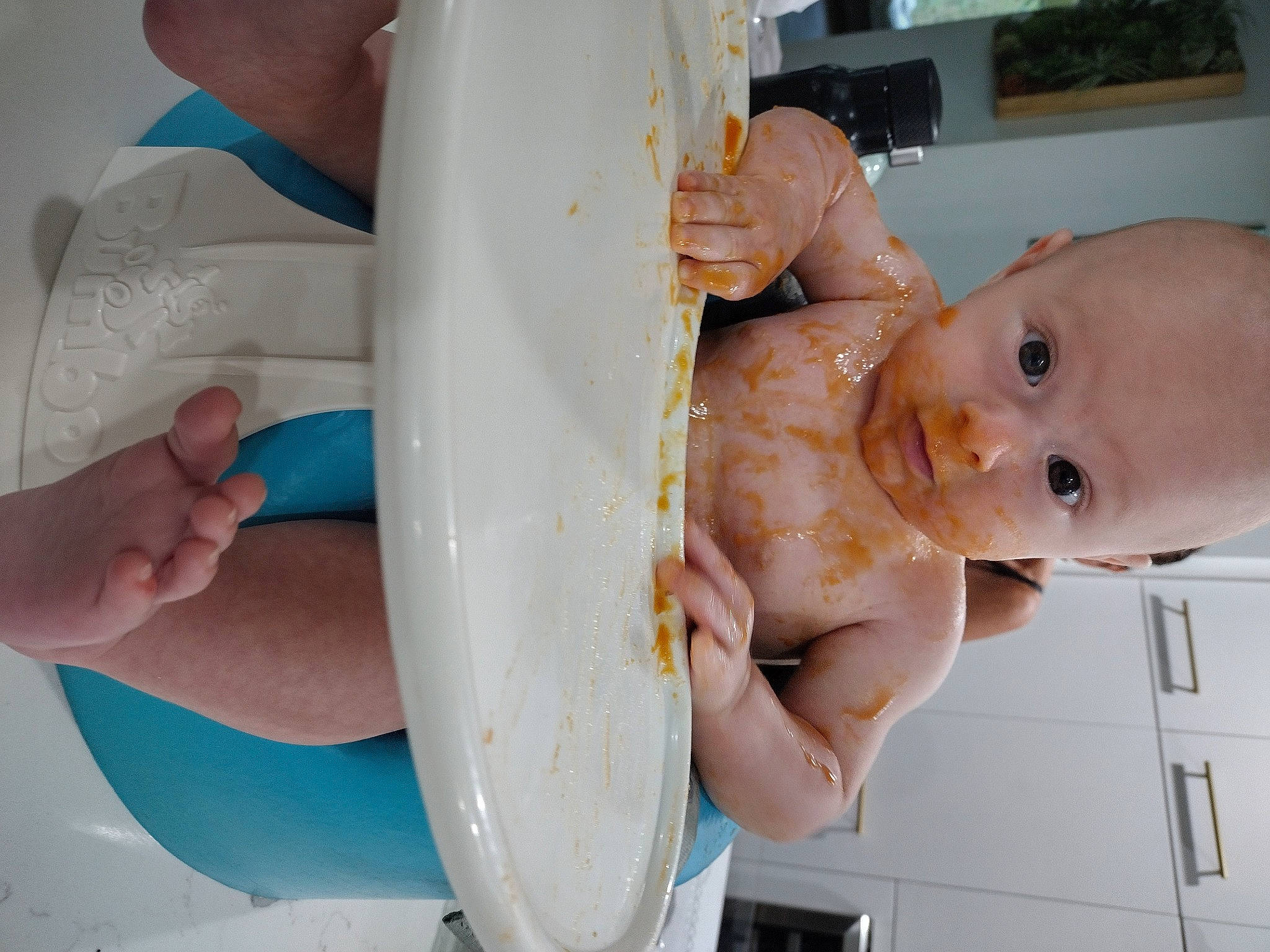Tyson is registered to the contest to win money with this photo: baby, baby_food, baby_products, baby_safety, baby_toddler_clothing, bathing, chest, child, dairy, drinkware, finger, food, gesture, hand, joint, nail, person, skin, surprise, tableware