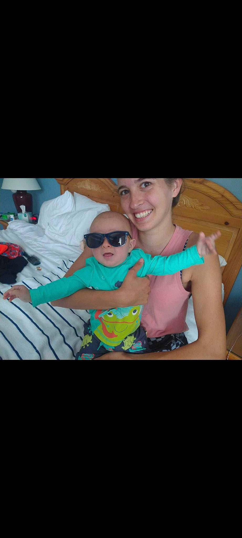 Tyson joined the competition — help win amazing prizes! child, comfort, event, eyewear, fun, gesture, goggles, happy, hat, headwear, joy, leisure, person, room, shorts, sitting, smile, sunglasses, t_shirt, thigh