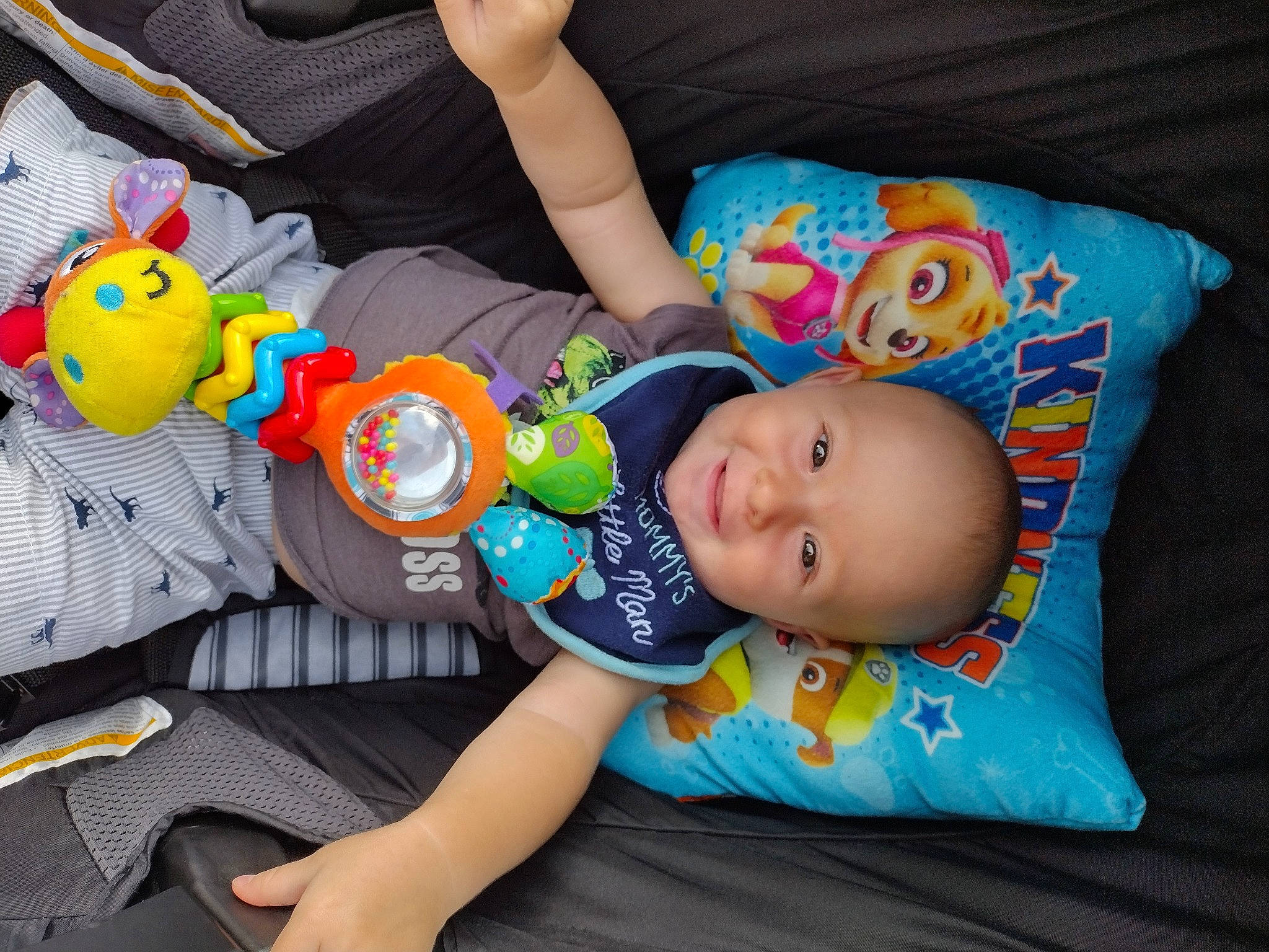 Tyson is registered to the contest to win money with this photo: arm, baby, baby_products, baby_toddler_clothing, baby_toys, cheek, child, comfort, fun, hand, hat, human_body, people, person, product, room, sitting, smile, t_shirt, textile