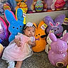 baby, blue, bunny, carpet, celebration, child, colorful, decoration, dress, headband, holiday, indoor, orange, peeps, pink, plush_toy, purple, stuffed_animal, toy, white_shoes