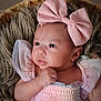 baby, newborn, infant, bow, headband, pink, tulle, basket, fur_blanket, portrait, close_up, cute, eyes, hand, soft_texture, sleepy, adorable, dress, studio_shot, smiling