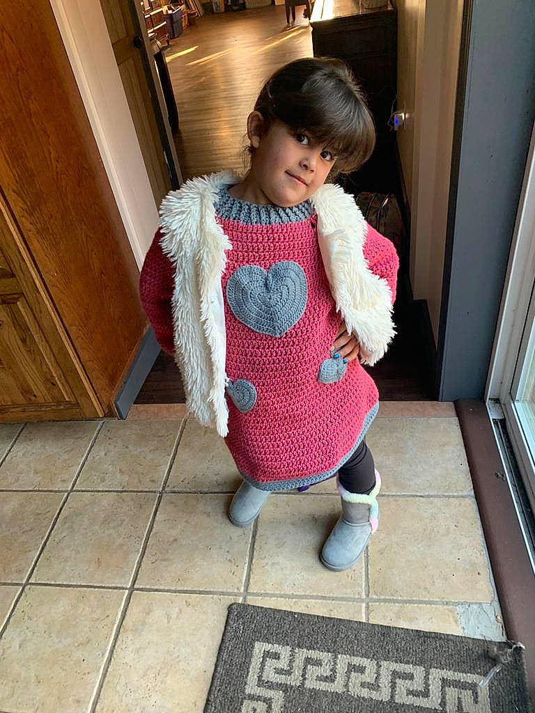 Sapphire joined the competition — help win amazing prizes! baby_toddler_clothing, black_hair, child, dress, face, fashion_design, floor, flooring, hardwood, knee, leg, pattern, person, sleeve, standing, textile, thigh, toddler, trunk, waist