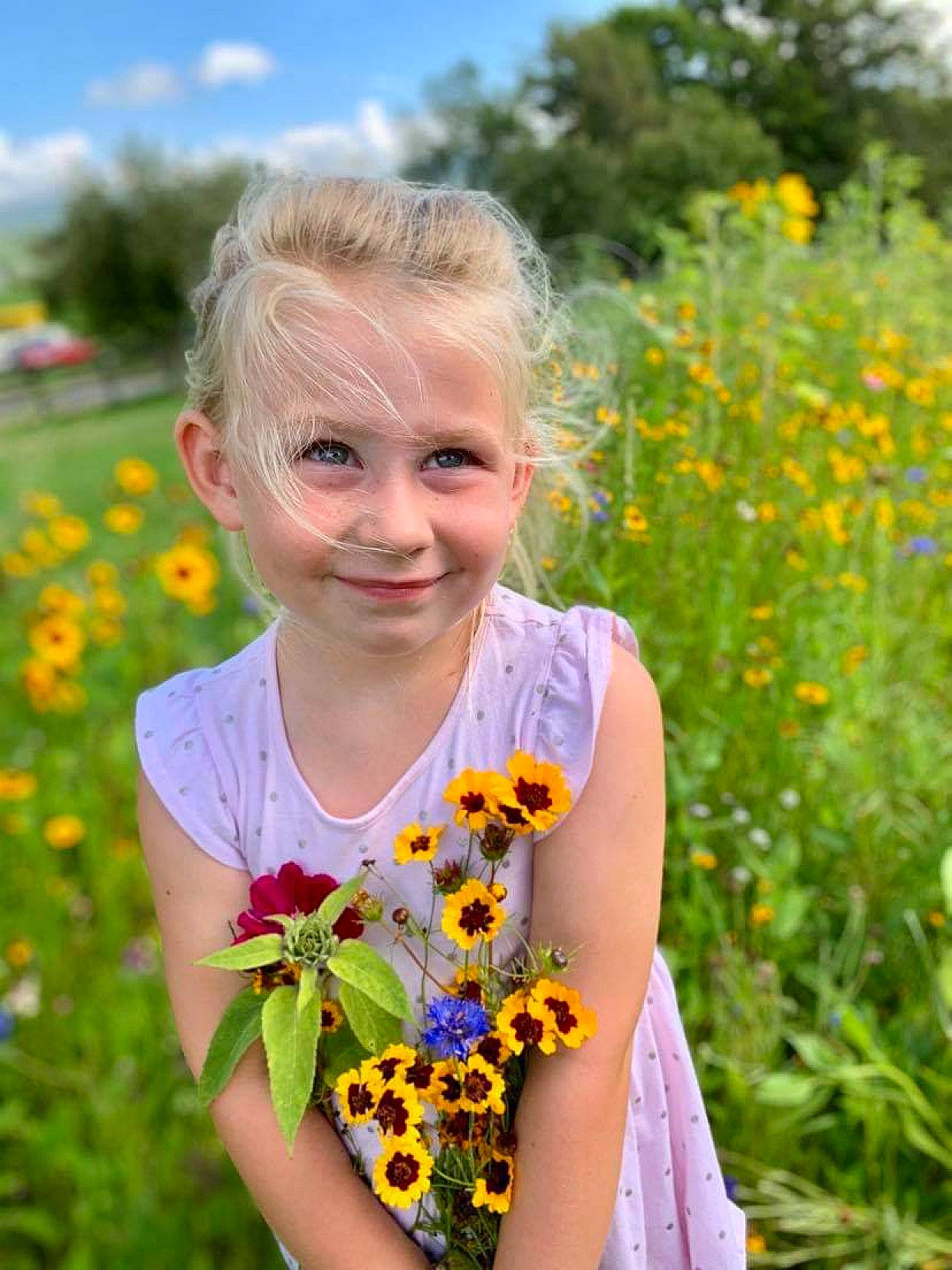 Peightyn is registered to the contest to win money with this photo: annual_plant, blond, bluebonnet, botany, child, flower, flowering_plant, grass, happy, iris, joy, meadow, people_in_nature, person, plant, prairie, spring, summer, sunflower, toddler