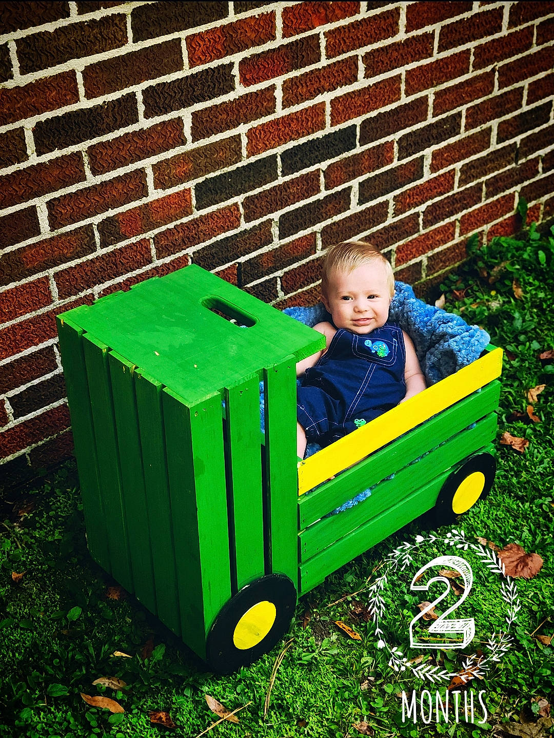 Taylor joined the competition — help win amazing prizes! baby, baby_toddler_clothing, brick, brickwork, child, electric_blue, fun, grass, green, lawn, motor_vehicle, people_in_nature, person, plant, product, rolling, tire, toddler, vehicle, wheel