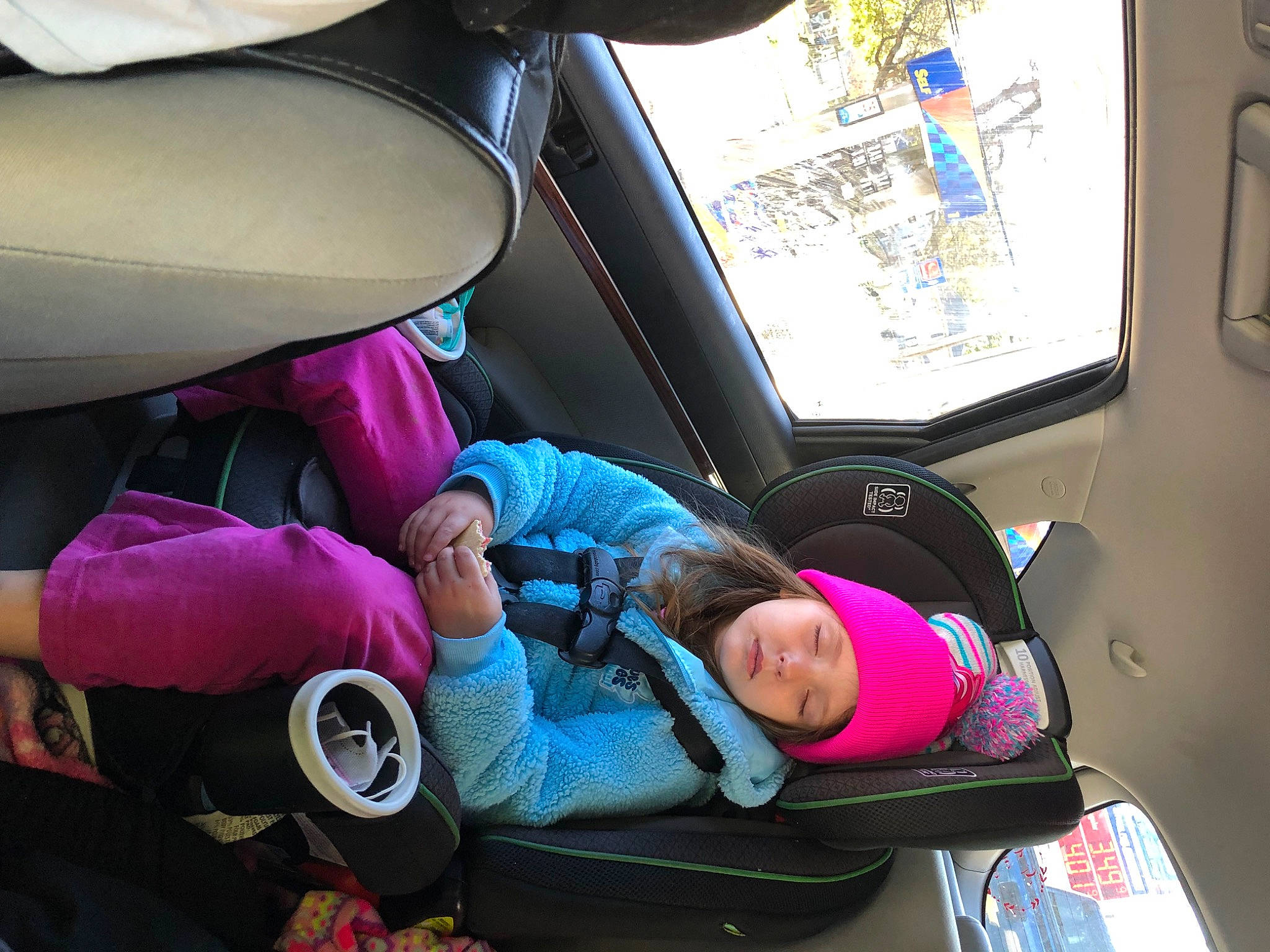 Sapphire is registered to the contest to win money with this photo: air_travel, auto_part, automotive_design, automotive_exterior, car, car_seat, comfort, family_car, fun, head_restraint, headwear, leisure, luxury_vehicle, mode_of_transport, motor_vehicle, passenger, person, purple, toddler, vehicle