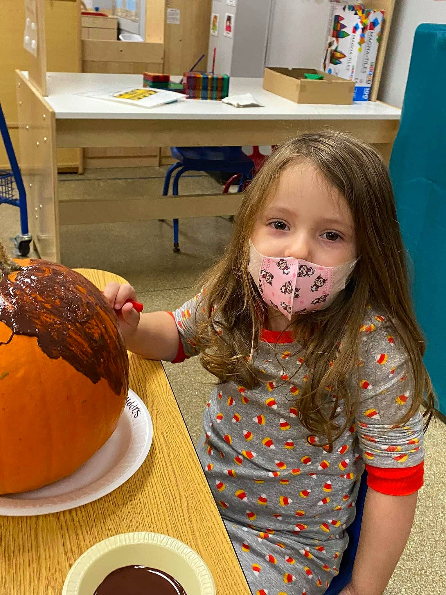 Sapphire is registered to the contest to win money with this photo: baking, bookcase, chair, child, comfort_food, cooking, cuisine, dish, food, fun, hairstyle, head, ingredient, pattern, person, plate, platter, sweetness, table, tableware