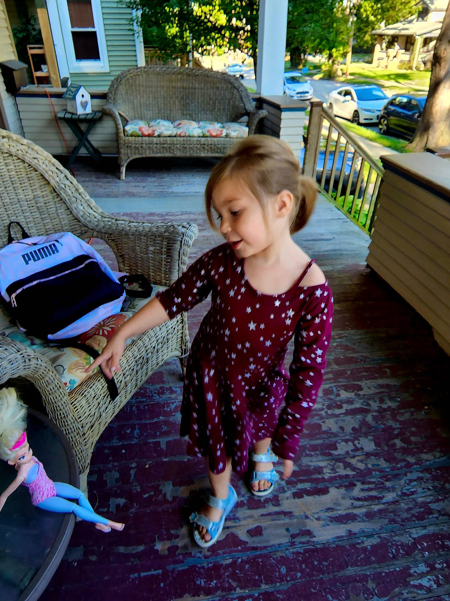 Cheyanne is registered to the contest to win money with this photo: bench, cap, child, event, fun, grass, hairstyle, happy, leaf, leisure, magenta, pattern, person, plant, recreation, sandal, sitting, summer, toddler, tree