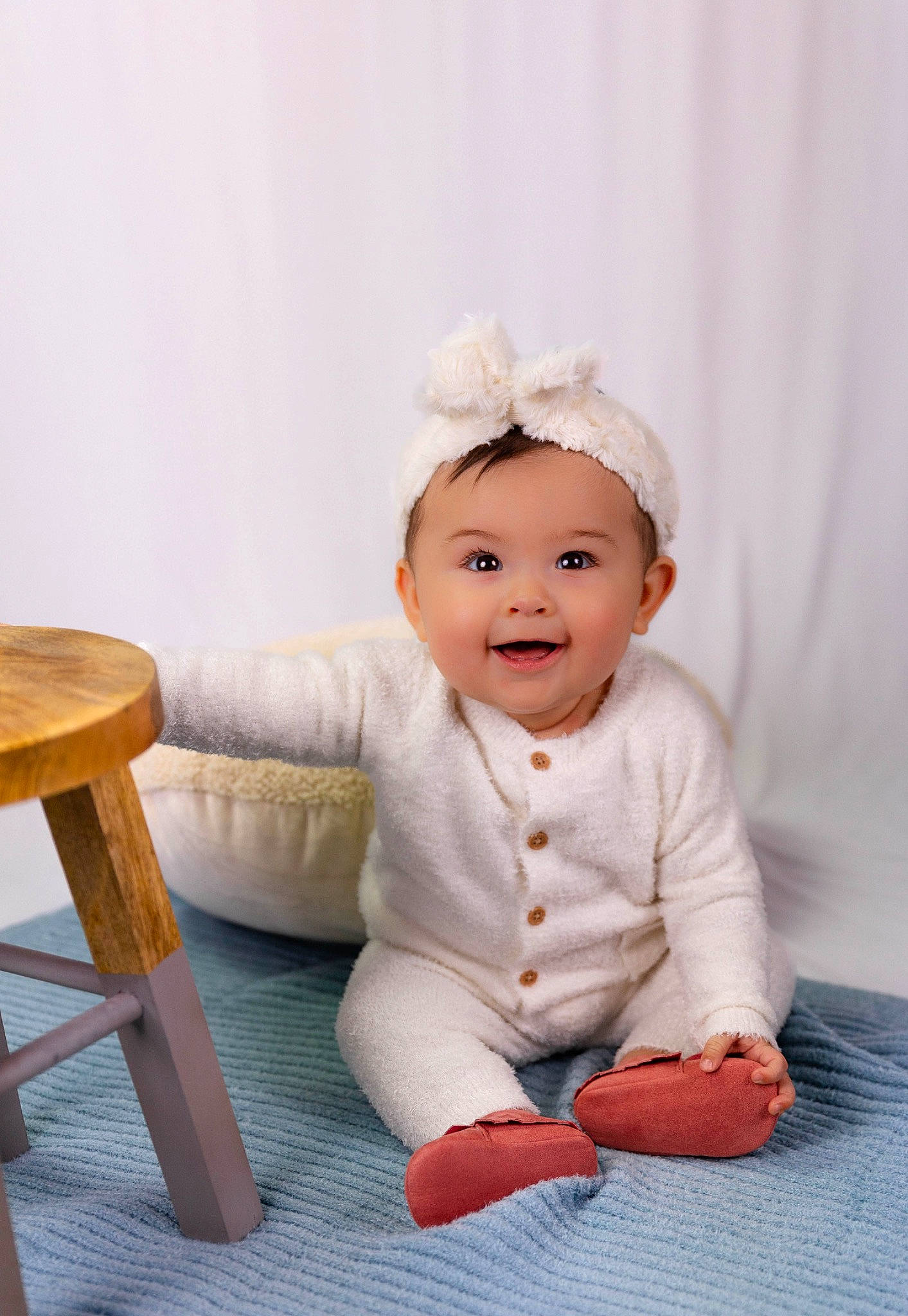 Esme joined the competition — help win amazing prizes! baby, baby_toddler_clothing, bar_stool, cheek, child, fashion_accessory, flash_photography, hair_accessory, happy, hat, headband, headwear, human_body, joy, outdoor_furniture, person, sitting, sleeve, smile, stool