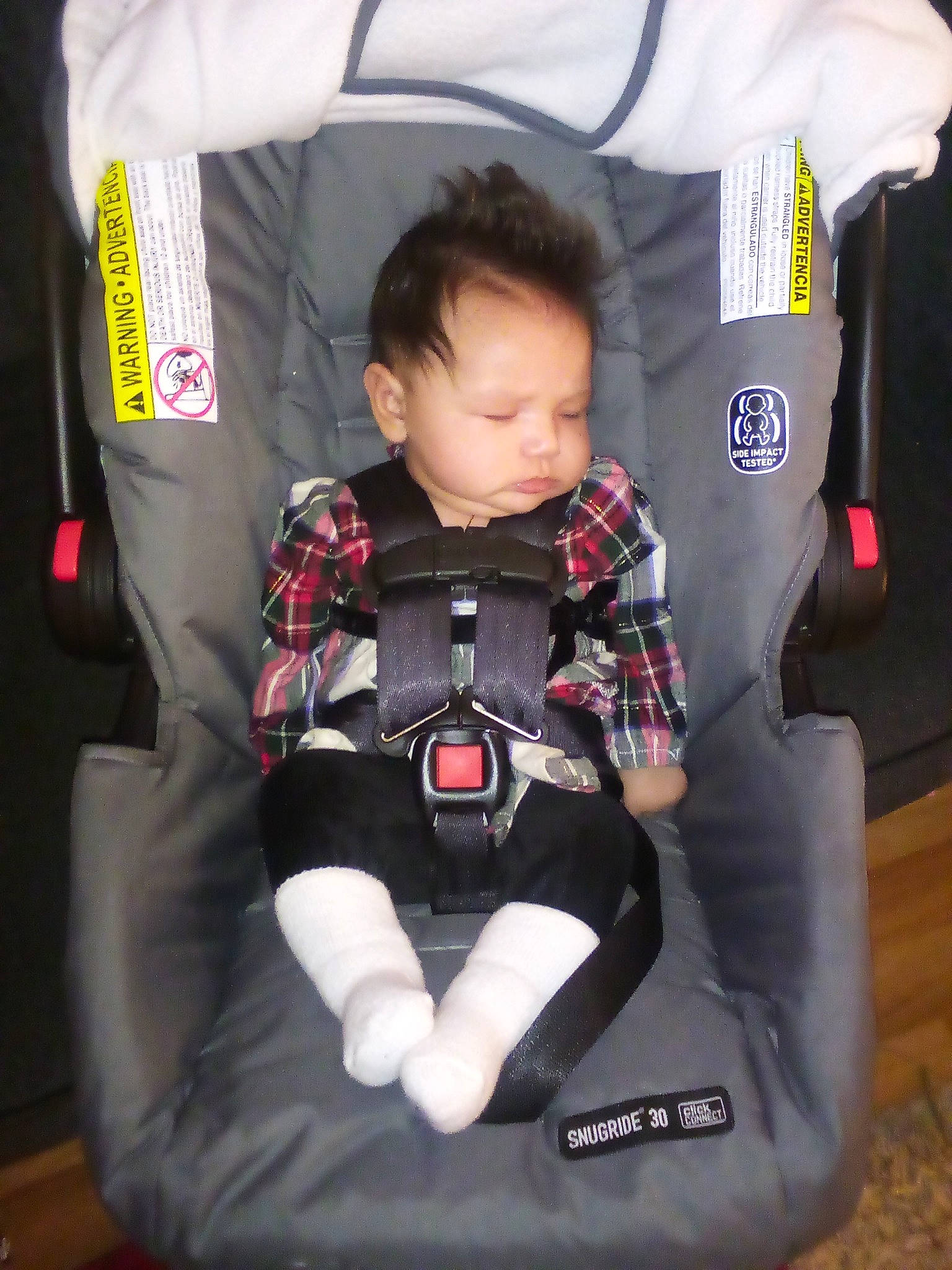 Rockii Mìra joined the competition — help win amazing prizes! baby, baby_carriage, baby_in_car_seat, baby_products, baby_safety, baby_toddler_clothing, car_seat, carmine, child, comfort, lap, person, play, product, red, shoe, sitting, toddler, toy