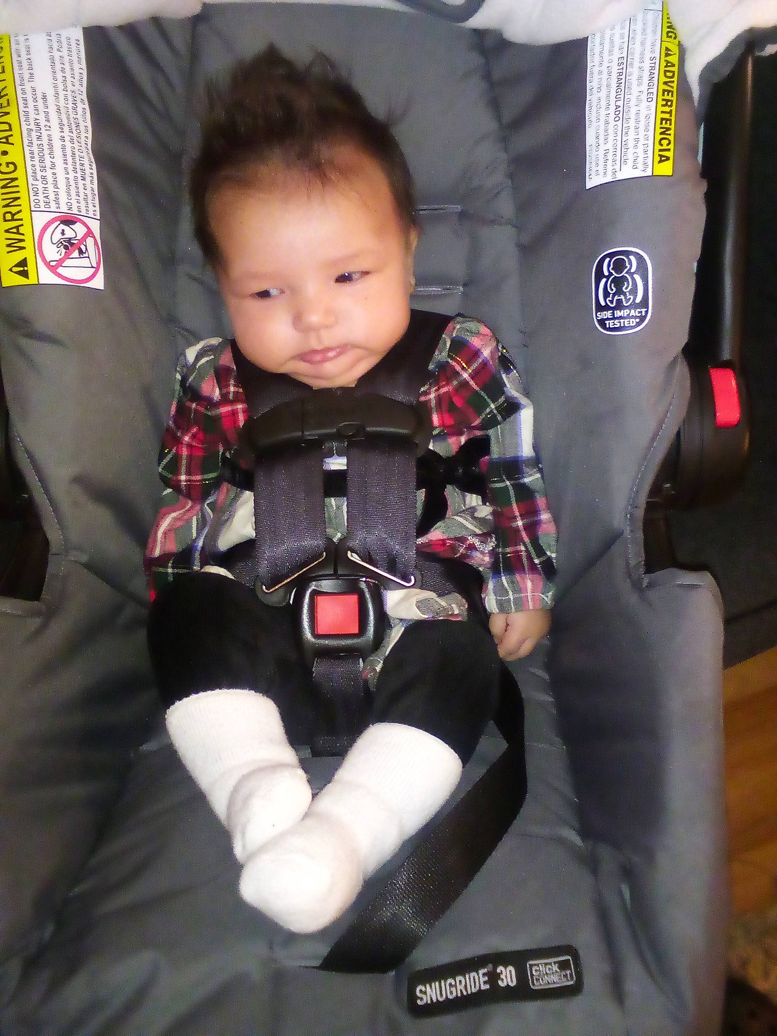 Rockii Mìra is registered to the contest to win money with this photo: baby, baby_carriage, baby_in_car_seat, baby_products, baby_safety, baby_toddler_clothing, car_seat, carmine, child, comfort, lap, person, play, product, seat_belt, sock, toddler, toy