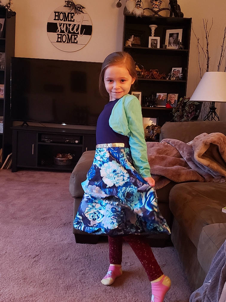 Remington joined the competition — help win amazing prizes! day_dress, dress, electric_blue, event, fashion_design, floor, flooring, formal_wear, fun, happy, human_leg, joint, joy, lamp, one_piece_garment, person, sandal, shoulder, standing, textile