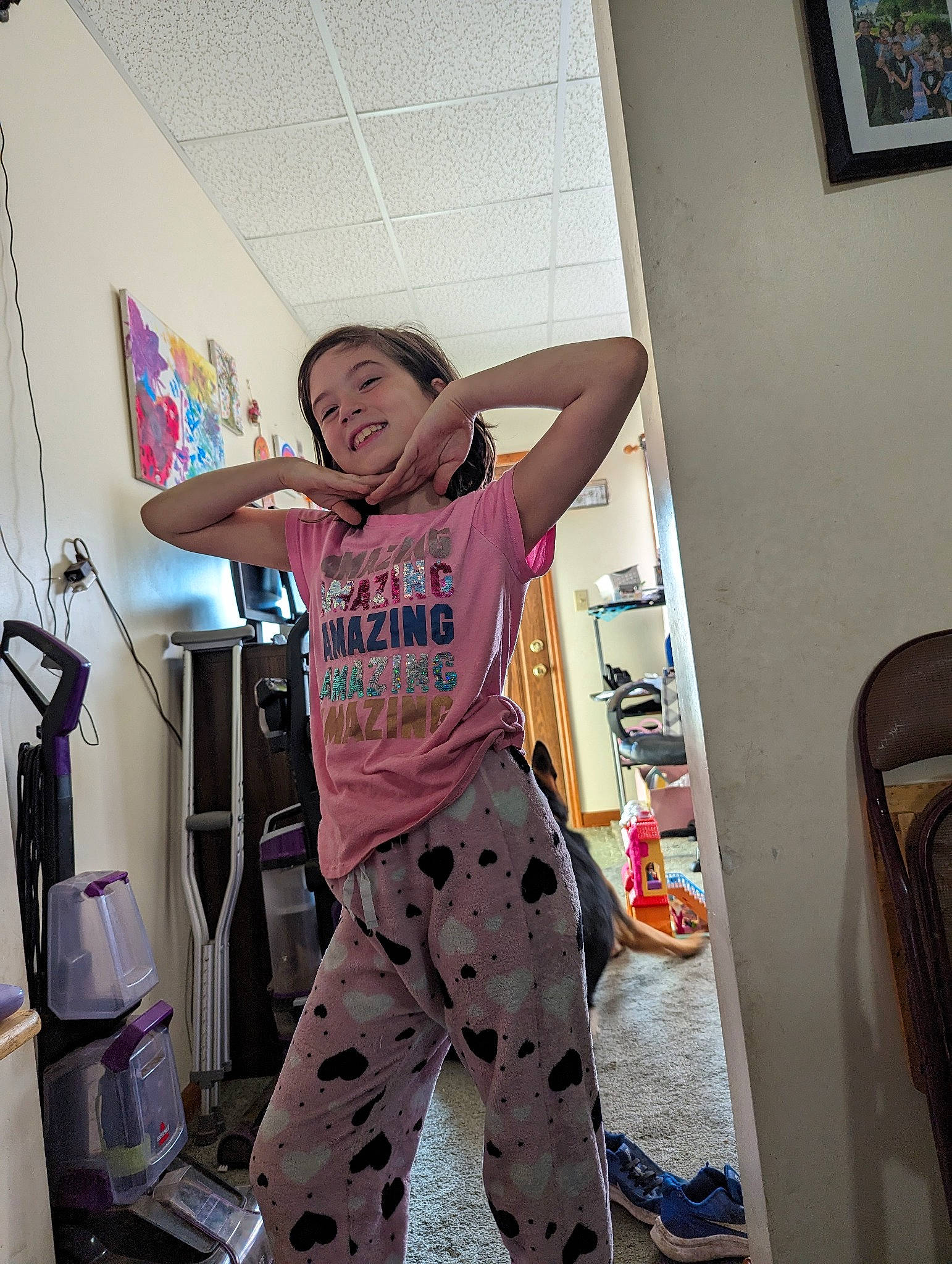 Shea is registered to the contest to win money with this photo: abdomen, bag, costume, flooring, fun, happy, human_leg, joy, knee, magenta, pajamas, person, picture_frame, room, selfie, sitting, smile, sportswear, t_shirt, thigh