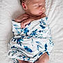 Denver is registered to the contest to win money with this photo: baby, baby_toddler_clothing, cheek, child, collar, comfort, elbow, happy, head, linens, neck, nose, pattern, sitting, skin, sleeve, stomach, t_shirt, textile, toddler
