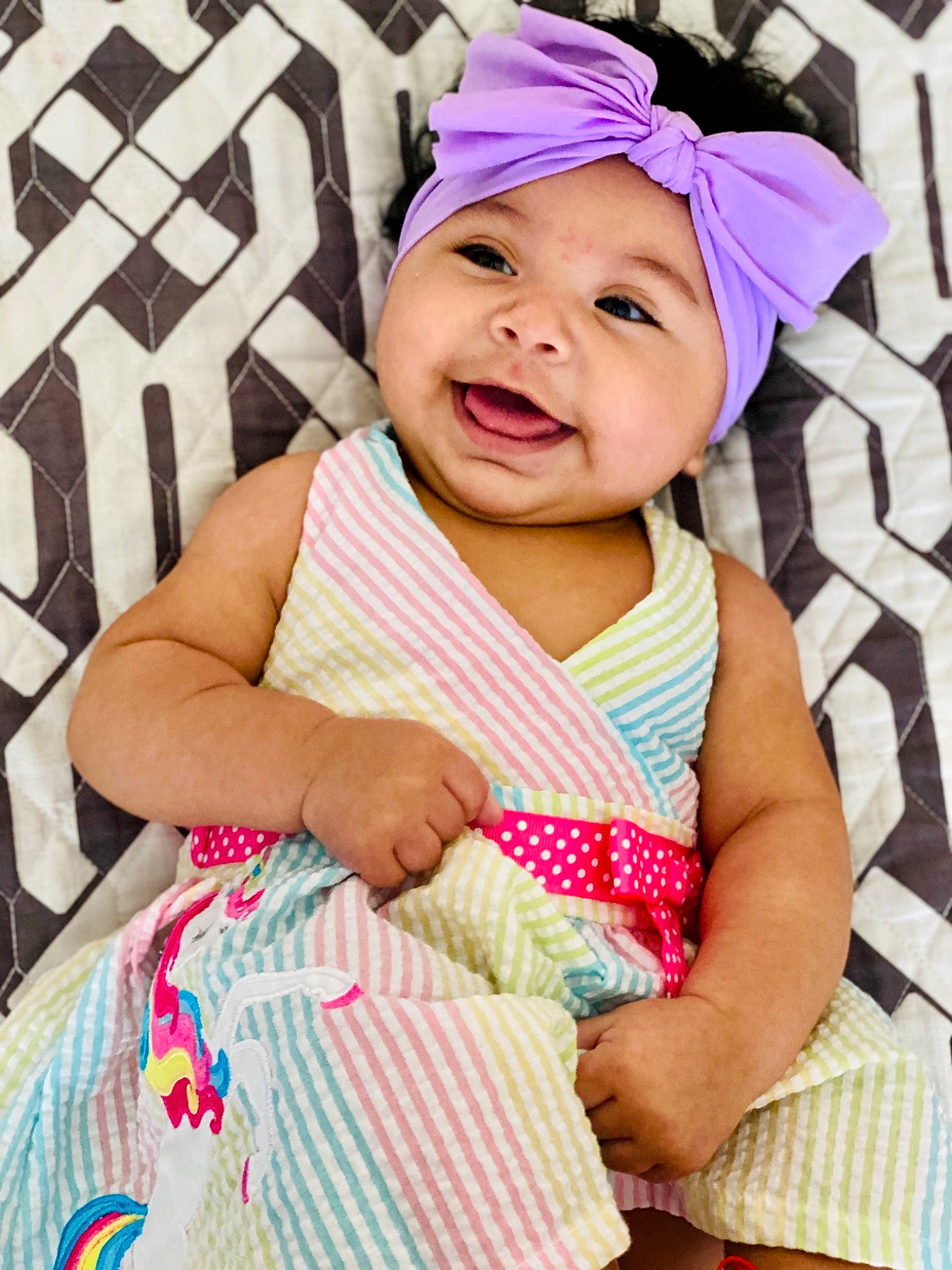 Aribella joined the competition — help win amazing prizes! baby, baby_laughing, baby_products, baby_toddler_clothing, cap, child, design, event, happy, hat, head, headwear, linens, pattern, person, pink, skin, sleeve, smile, textile