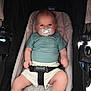 Martin a rejoint le concours — aidez-le/la à gagner de superbes lots ! baby, pacifier, stroller, child, infant, blue_shirt, white_shorts, seatbelt, cute, portrait, indoor, person, young_child, baby_clothing, sitting, child_seat, baby_face, baby_hands, baby_legs, childcare