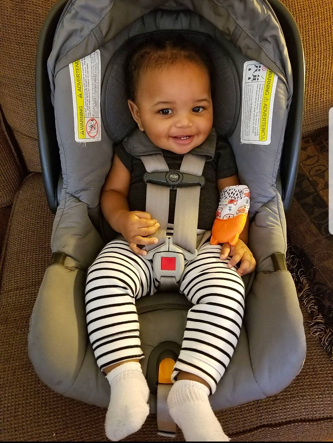 Diego joined the competition — help win amazing prizes! baby, baby_carriage, baby_in_car_seat, baby_toddler_clothing, car_seat, comfort, eye, face, finger, gesture, head, human_body, joy, knee, person, sleeve, smile, thigh, thumb, toddler