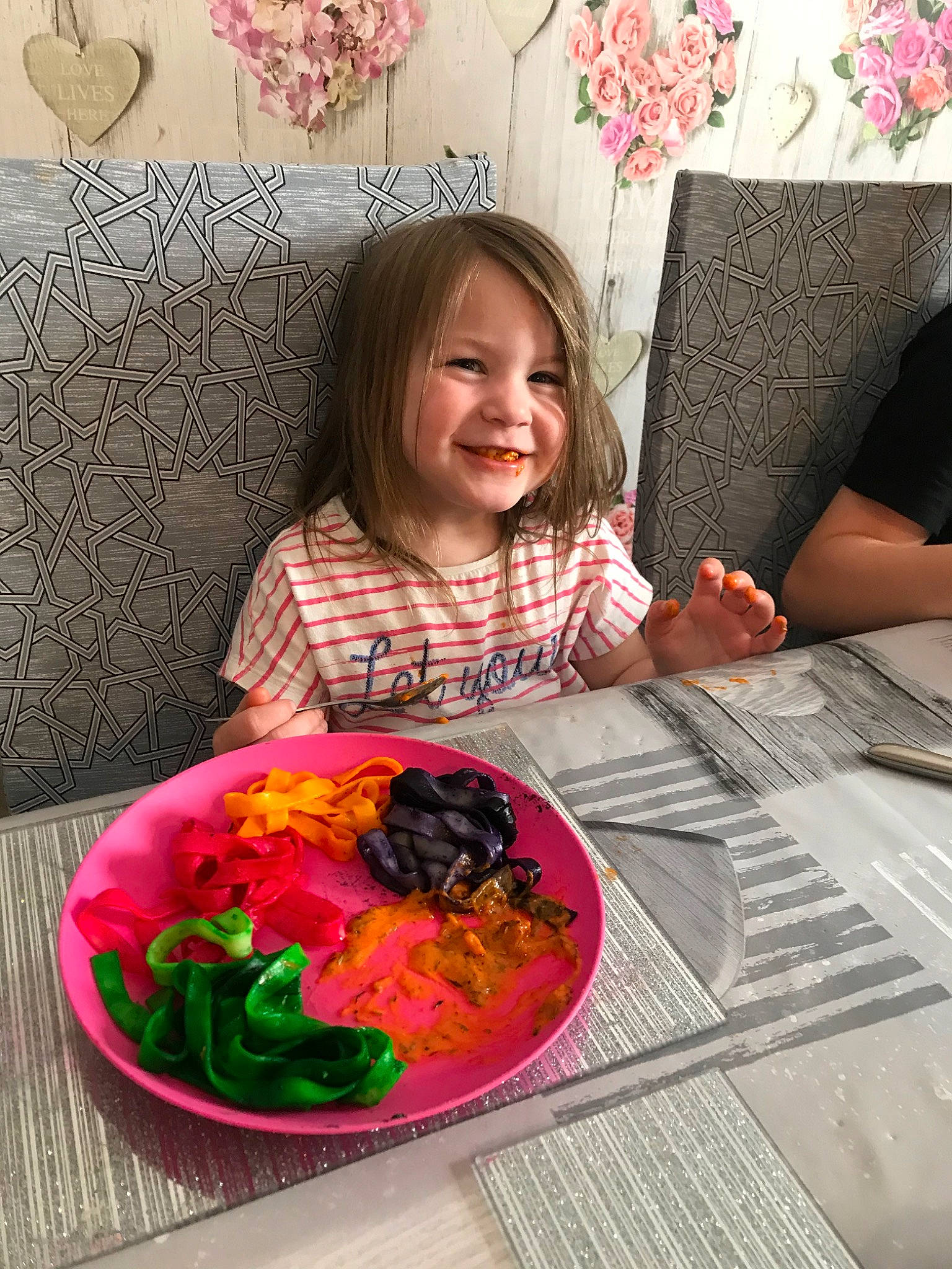 Emma is registered to the contest to win money with this photo: child, cuisine, dish, flower, food, joy, person, plant, play, toddler