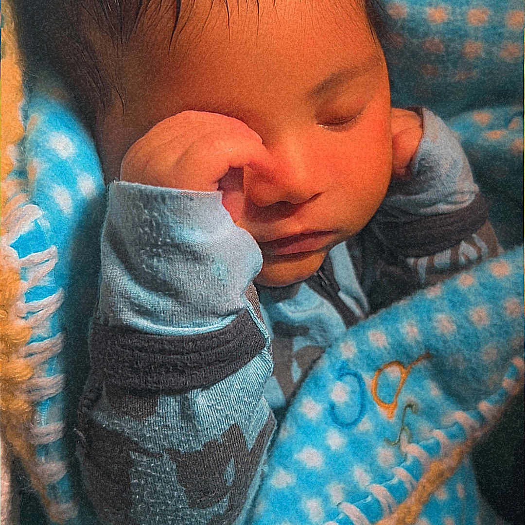 Jonahh joined the competition — help win amazing prizes! baby, sleeping, blanket, blue, polka_dot, cozy, infant, cute, soft, warm, wrapped, child, newborn, face, fist, clothing, peaceful, portrait, indoor, resting